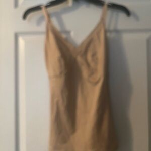 Spanx cami size large adjustable straps.  Worn once.